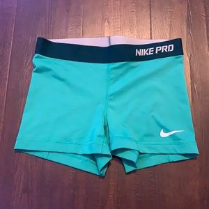 Mint green Nike pros